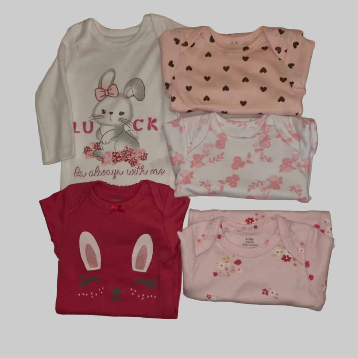Set de 5 bodies para bebé niña con estampados de conejitos y flores